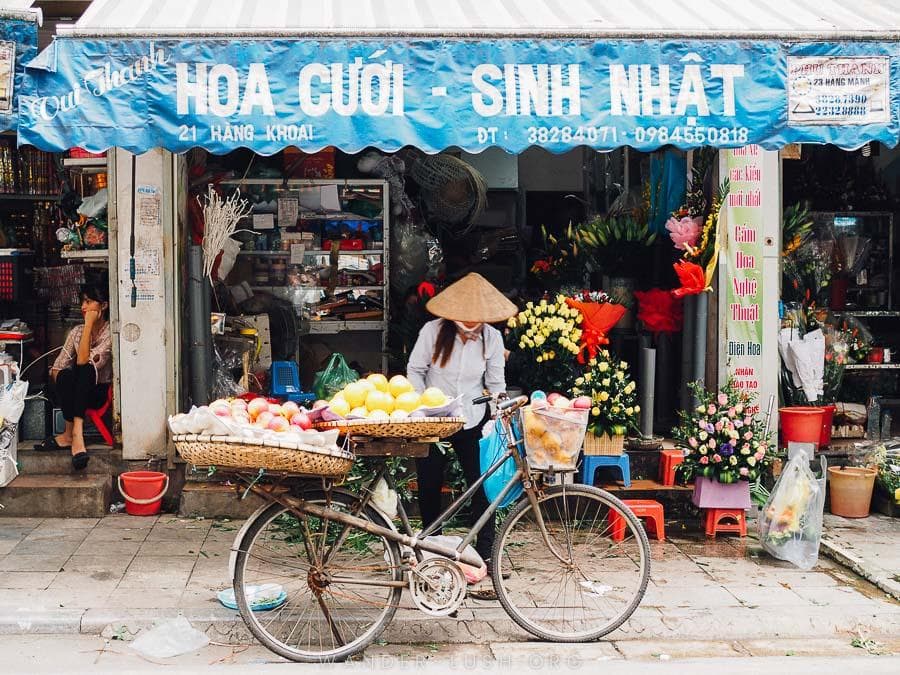A flower vendor in the Old Quarter, Hanoi.