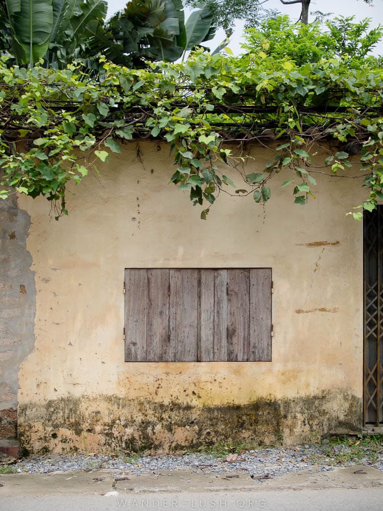 Wooden windows in Duong Lam Ancient Village near Hanoi.
