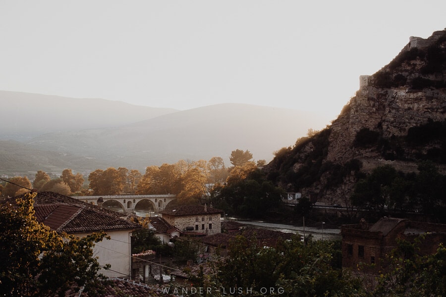 Sunset view of the city and stone bridge, one of the best things to do in Berat.