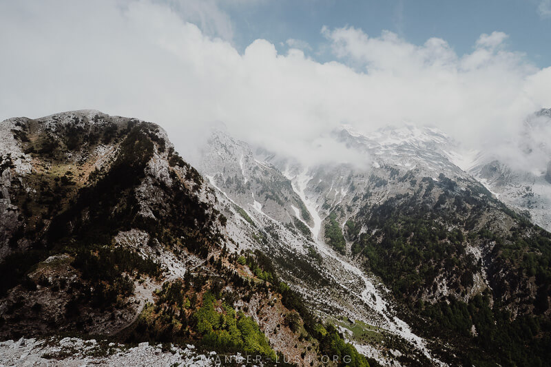 Ice and snow atop high mountains in the Valbona Pass.