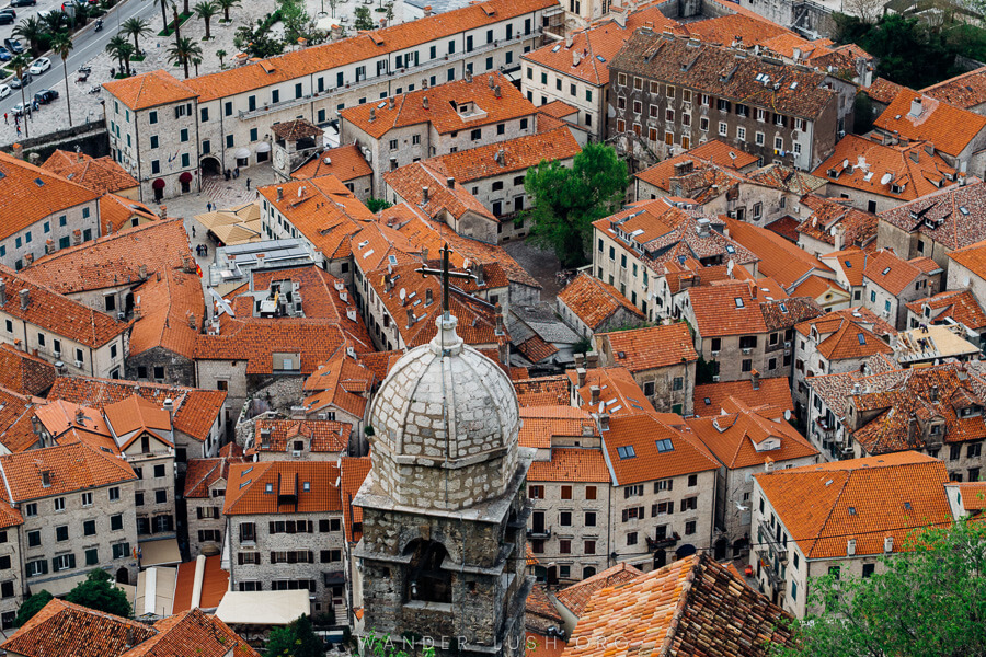 An old town with red roofs, seen on a Montenegro road trip.