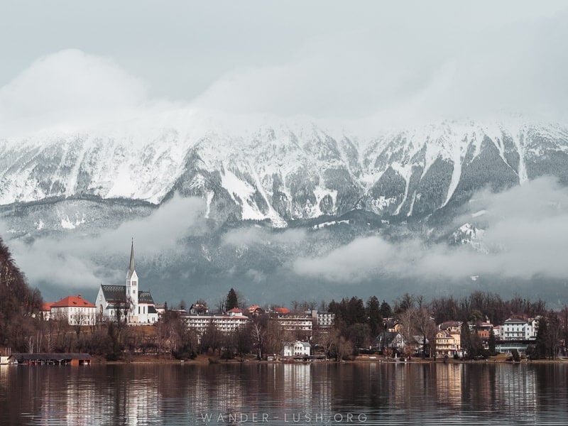 Snow-capped mountains and a pretty Lake Bled in Slovenia.