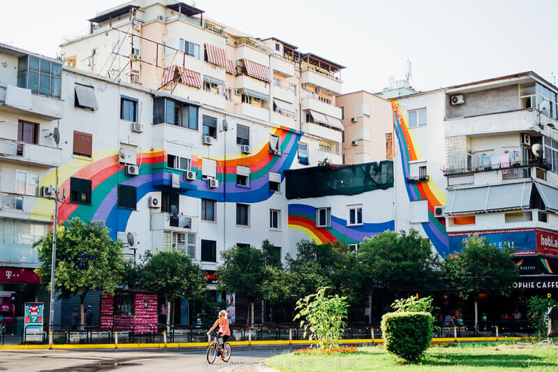 A rainbow painted across an apartment building in Tirana, Albania.
