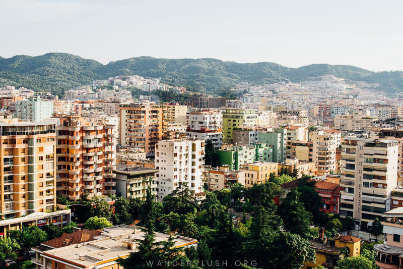 Apartment blocks and mountains in Tirana, Albania.