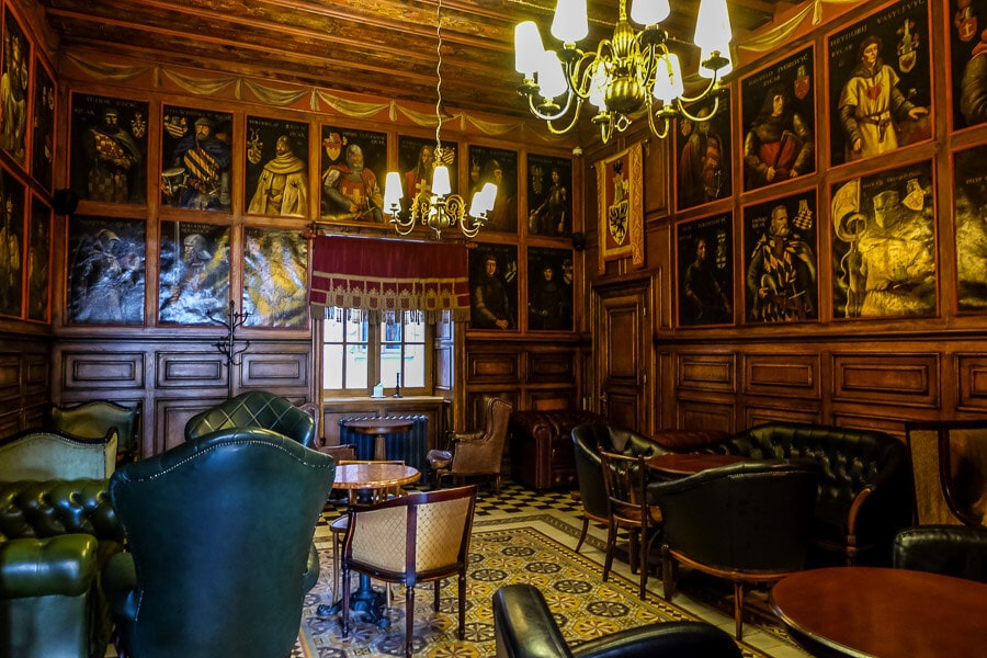 Wood panelling and paintings inside Lviv's Atlas Cafe.