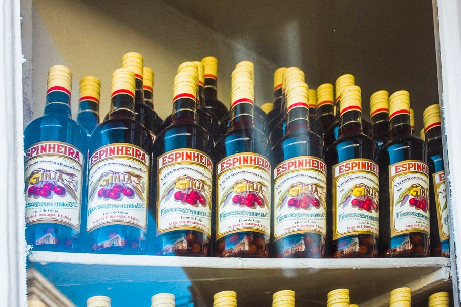 Bottles of Portugese cherry liqueur, ginja, in a shop in Portugal.