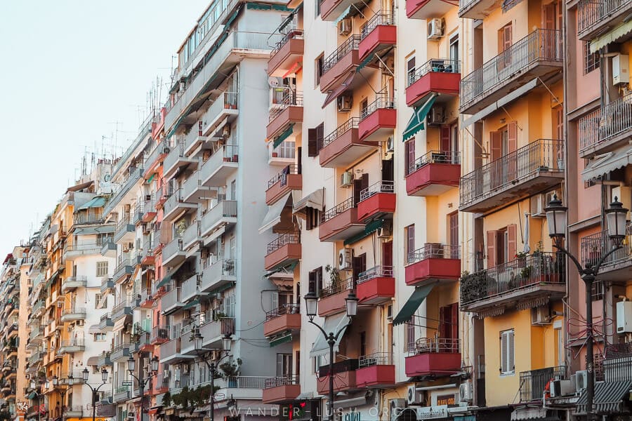 A row of colourful apartment buildings in Thessaloniki, Greece.