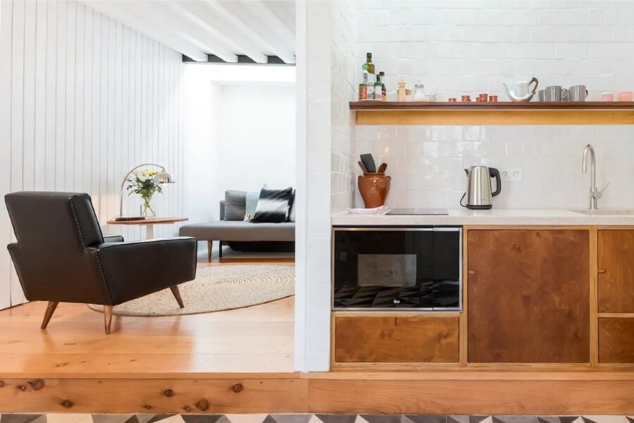 A renovated cottage in Lisbon with quirky architectural detailing and mid-century furniture.