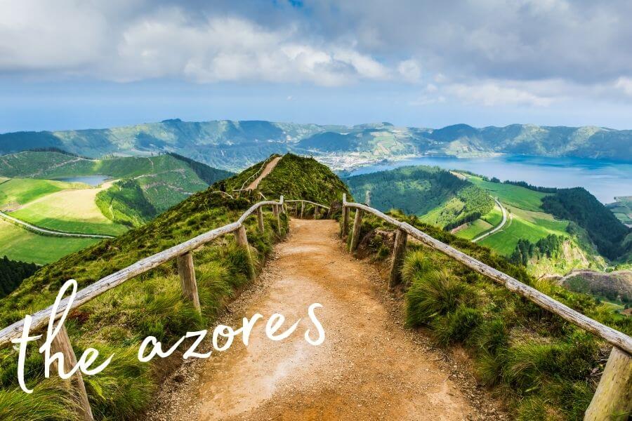 A walk path leads to a beautiful mountain landscape in the Azores islands.