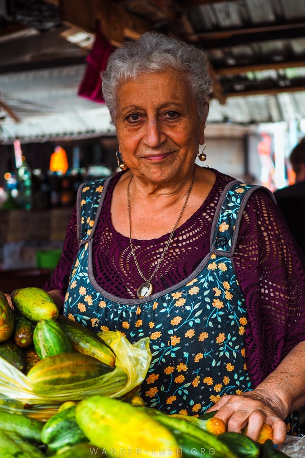 A woman poses for a photo at the Ozurgeti bazaar.