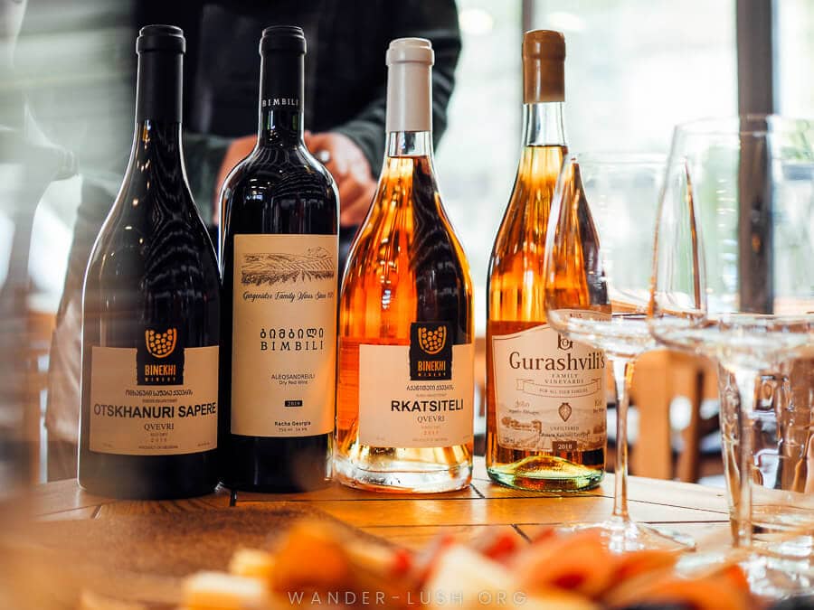 Bottles of Georgian amber wine at a bar in Tbilisi, Georgia.