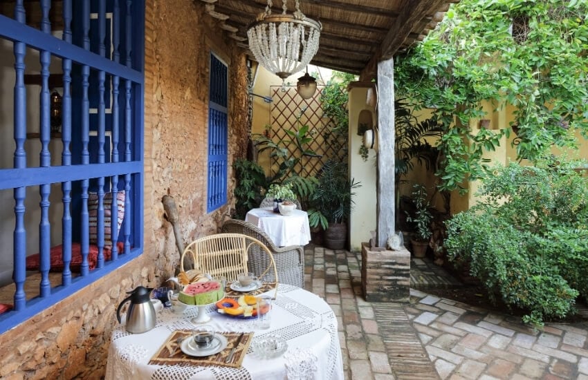 Breakfast served on a cafe table in a courtyard in Havana, Cuba.