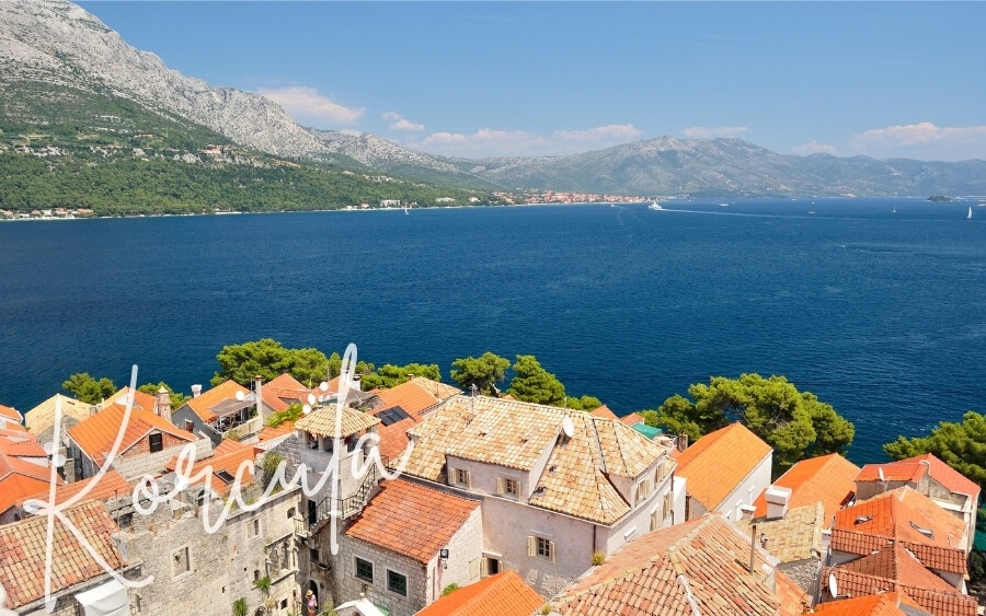 Looking over Korcula's orange rooftops out to the Adriatic and the mountains beyond.