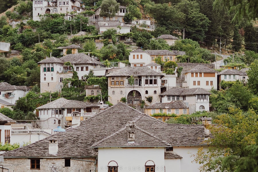 A front-on view of Ottoman-style houses in Gjirokaster, Albania.