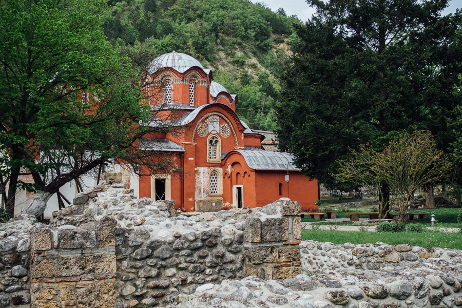 The Patriarchate of Pec, a red-coloured monastery in Kosovo.