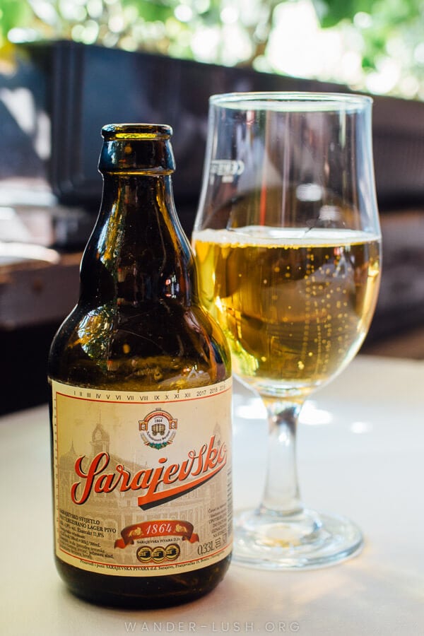 A bottle of local Sarajevo beer on a cafe table.