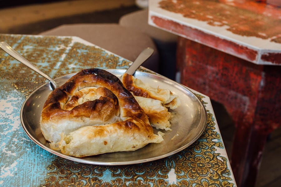 A plate of burek pastry at a restaurant in Bosnia and Herzegovina.