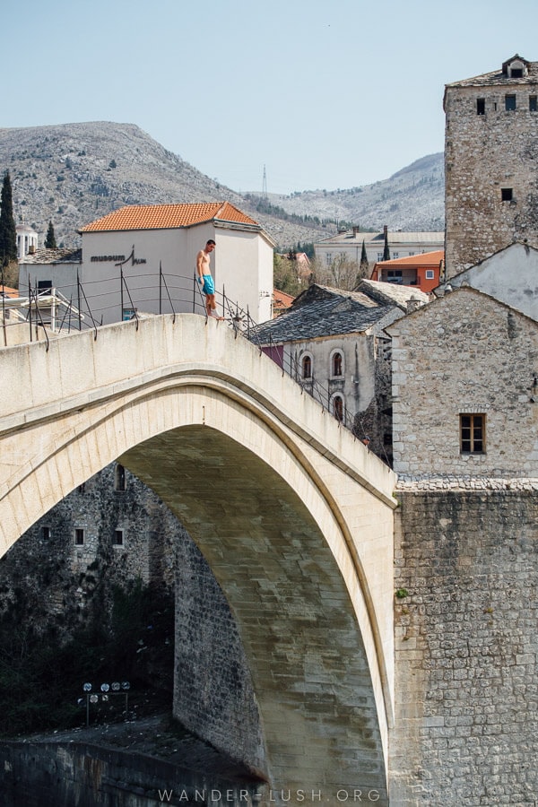 A bridge diver waits to jump off the Old Bridge in Mostar, Bosnia and Herzegovina.