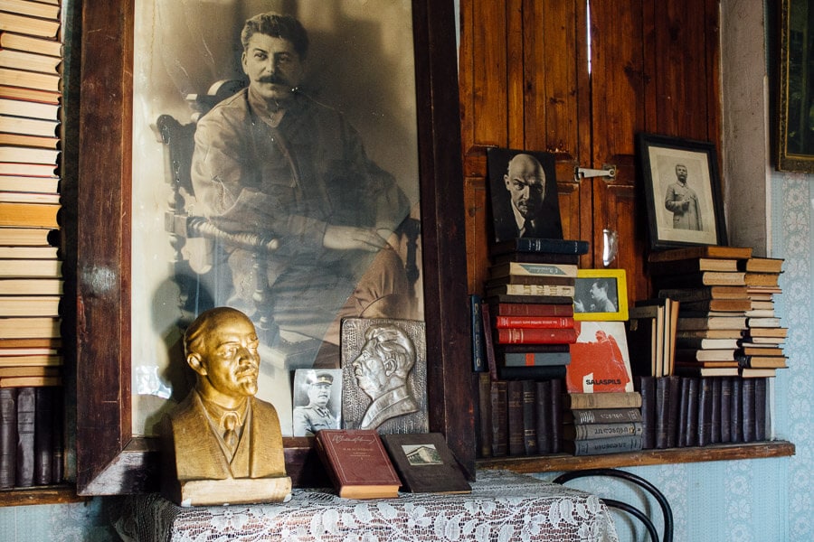 Communist party books and memorabilia, photos of Stalin and Lenin inside the Printing House Museum.