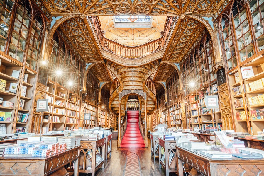 The red staircase inside the gorgeous Livraria Lello bookshop in Porto, Portugal.