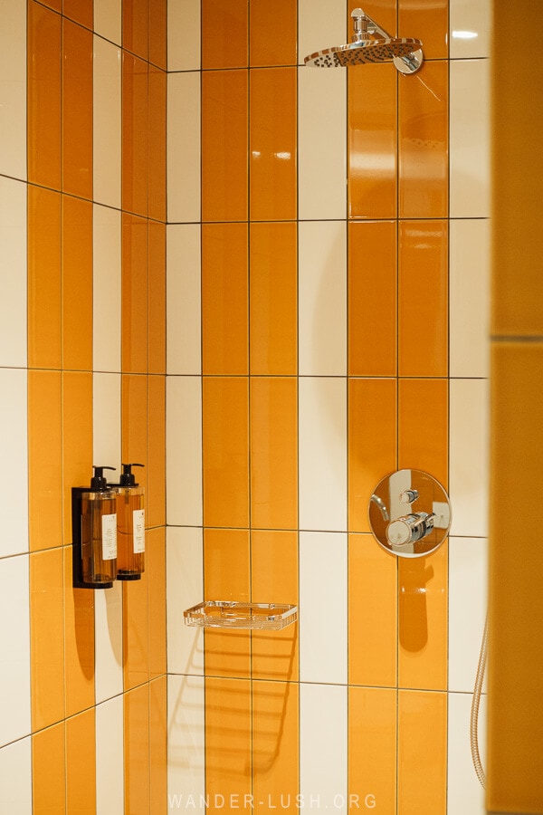 Bold coloured tiles in the bathroom at Bazzar Hotel Tbilisi.