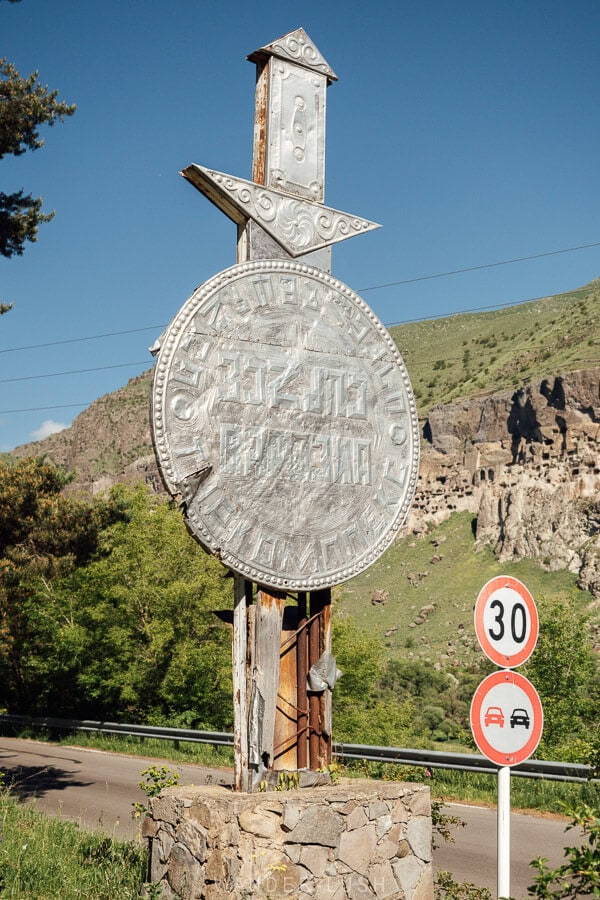 A Soviet-era sign marks the entrance to Vardzia in Georgia.