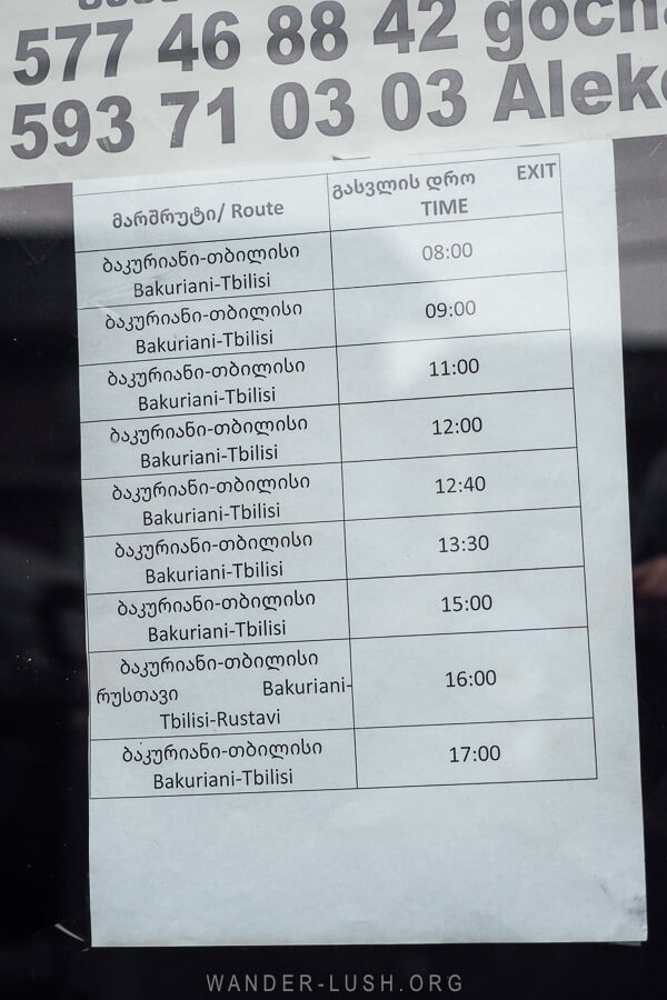 Bakuriani to Tbilisi marshrutka timetable pinned in the window of the bus station in Bakuriani.