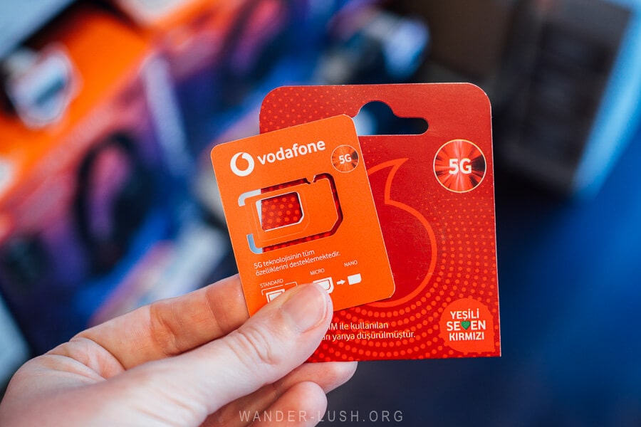 A red Vodafone sim card at a shop in Istanbul, the best sim card for tourists in Turkey.