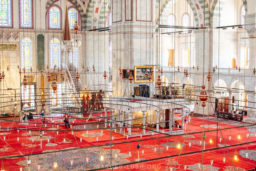 A red carpet inside the grand Fatih Mosque.