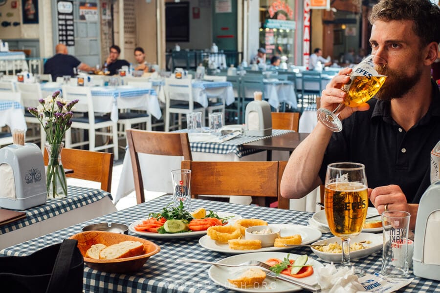 A man eats Lunch at Hamsi Pub, a seafood restaurant in Kadikoy, Istanbul.