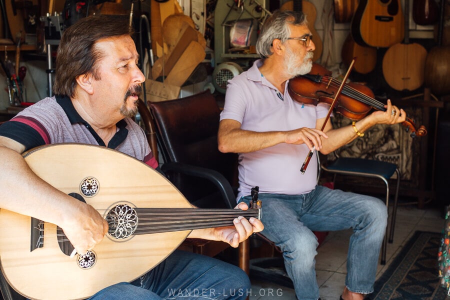 Two men play Turkish folk music in Uskudar district.