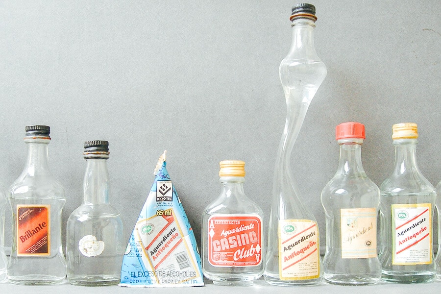 Different shaped bottles of aguardiente in Colombia.
