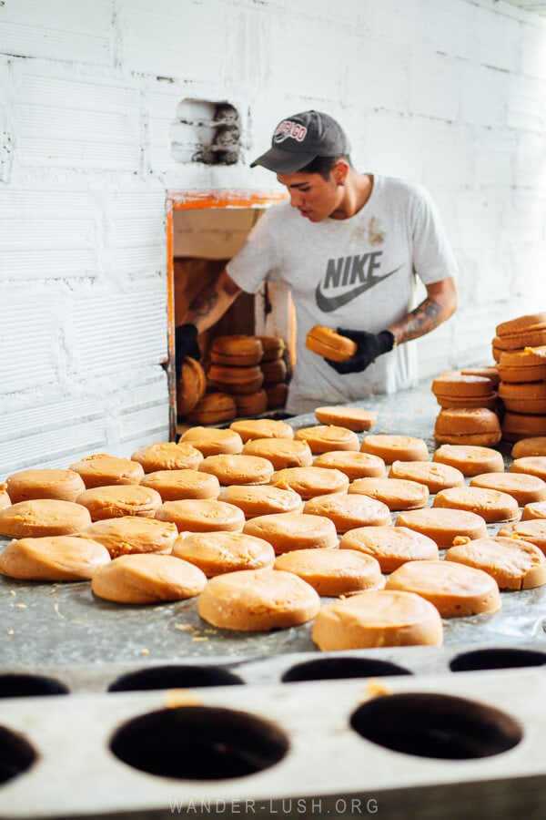 A man makes panela, round hard sugar in Jardin, Colombia.