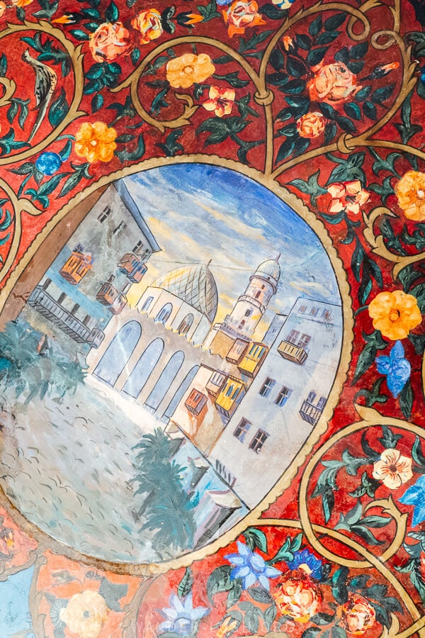 A painted design depicts a mosque at a heritage house turned museum in Tbilisi.