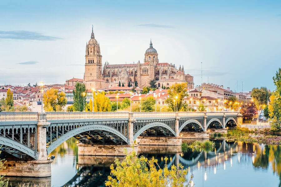 A bridge leading across the river to the Cathedral of Salamanca in Spain.