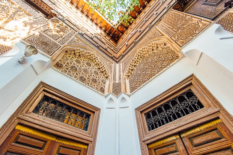 Intricate woodwork and carved doors inside the Bahia Palace in Marrakech.