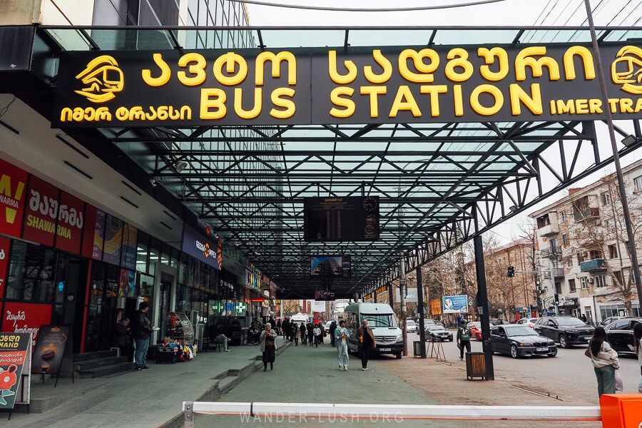 Vans wait under a modern roof at the Kutaisi Central Bus Station on Chavchavadze Avenue.