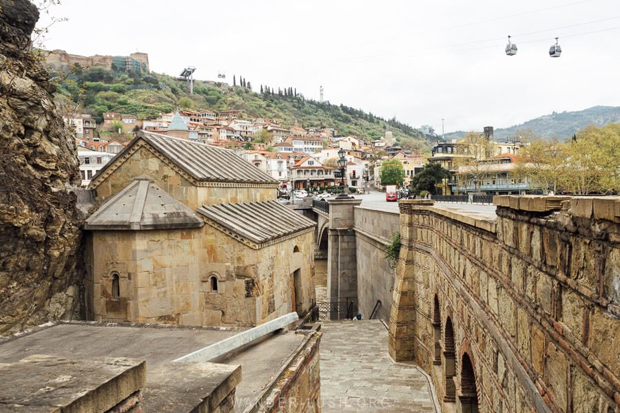 St Abo Tbileli Church, a hidden church in Tbilisi with a view of the Mtkvari River and Narikala Cable Car.