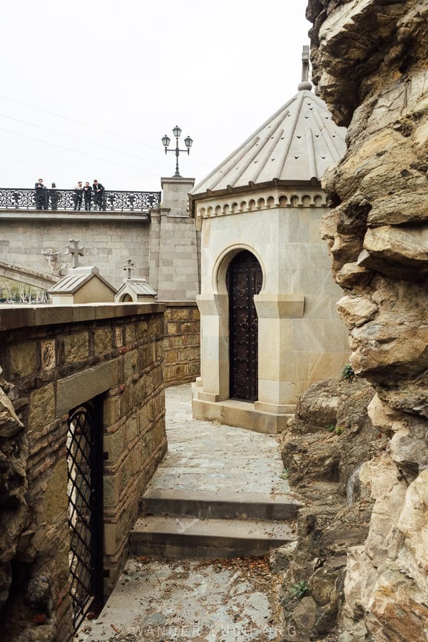 A tiny Orthodox chapel set in the side of a rocky cliff on the Mtkvari Riverside in Tbilisi.