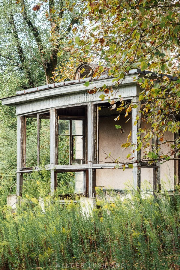 A wooden verandah with glass missing from its frames at Stalin's Dacha in Tskaltubo.