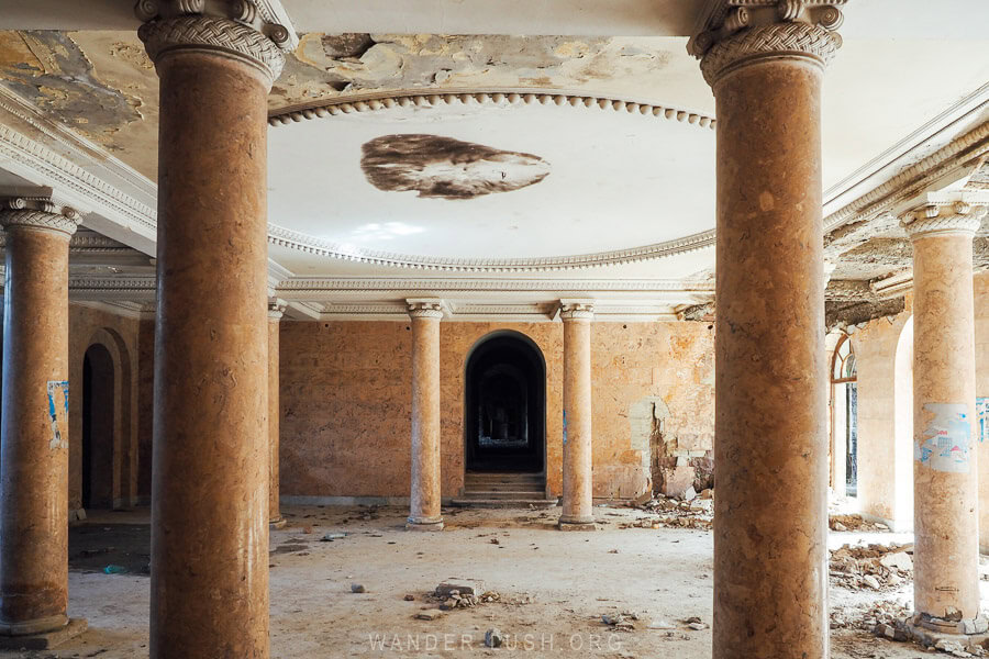 The entrance to Sanatorium Imereti, a beautiful Soviet-era hotel with faux marble columns and a decorated ceiling in Tskaltubo.