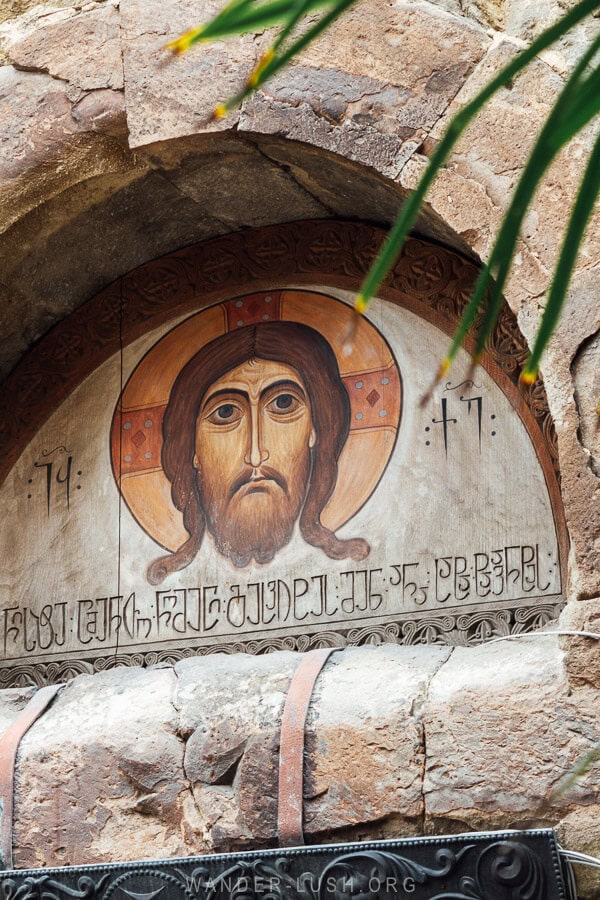 An image of the face of Jesus above the entry to the sacred Anchiskhati Basilica in Tbilisi.