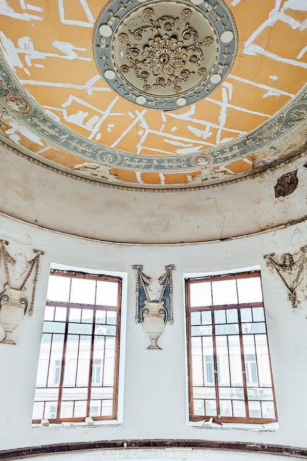 A beautifully painted ceiling and wall detailed inside the former Apollo Theatre in Tbilisi.