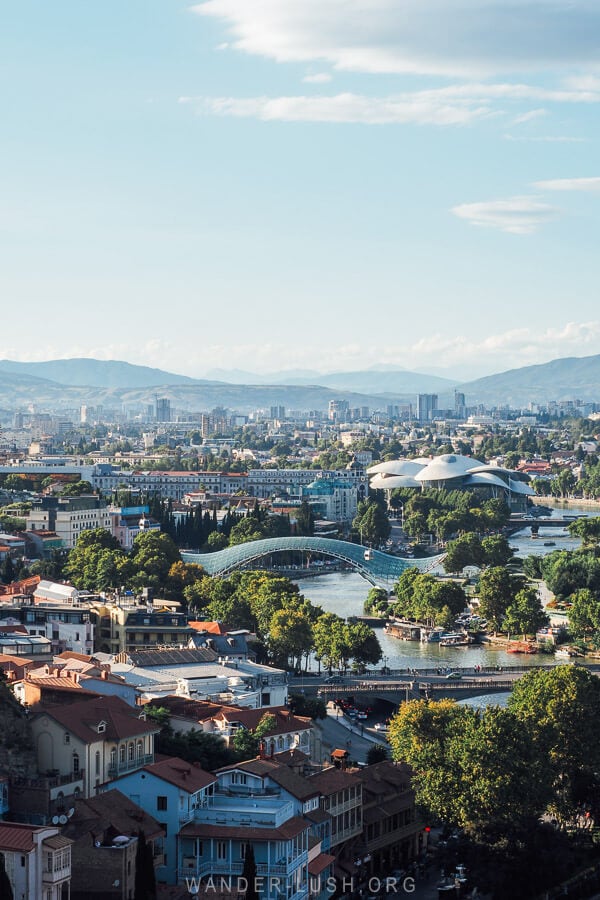 A view of Tbilisi City, the Bridge of Peace and Justice House on the Mtkvari River from a vantage point overlooking the Old Town.