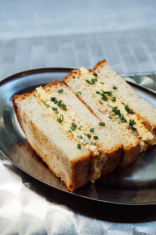 An egg sandwich served on a silver plate at a cafe in Tbilisi.