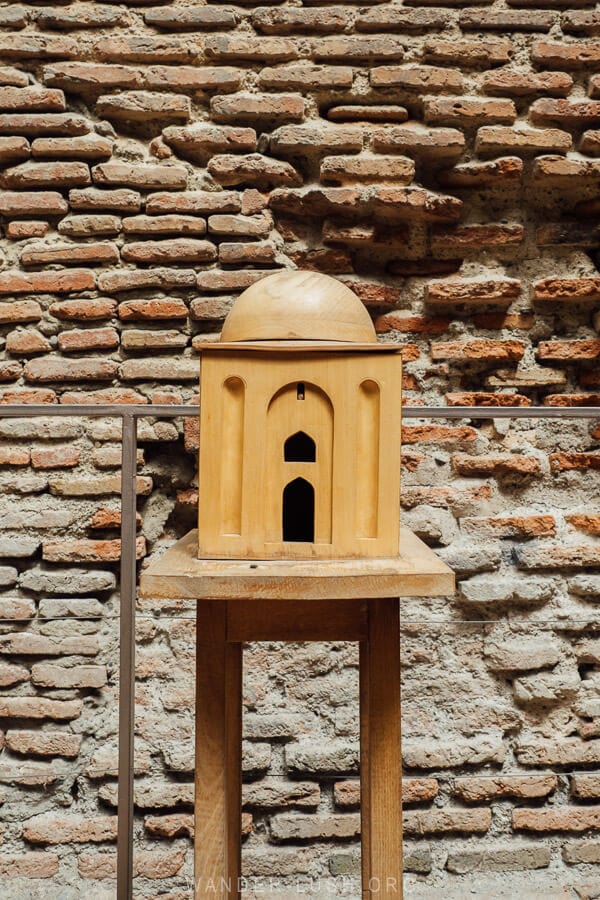 A model of a Zoroastrian fire temple sits on a plinth inside the Ateshgah in Tbilisi, Georgia.