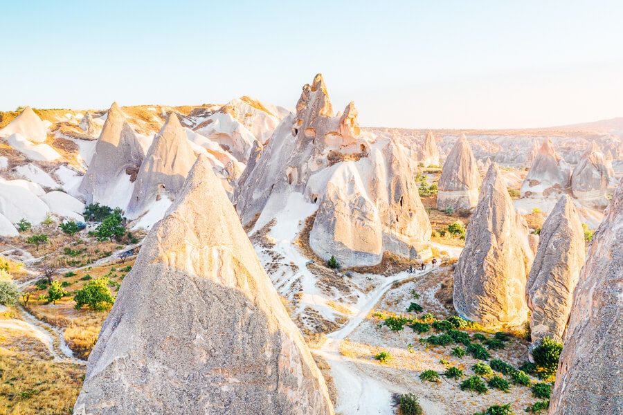 Sunrise view of rock formations from Lovers Hill in Cappadocia.