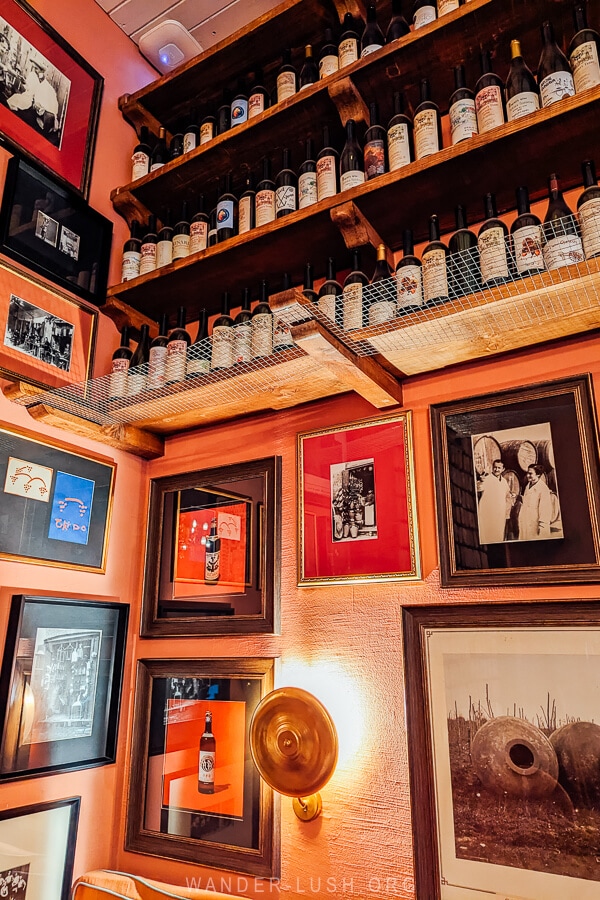 Framed photographs and drawings at Craft, an Instagrammable bar in Tbilisi.