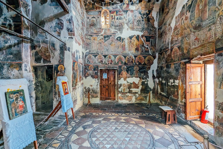 Original frescoes and a mosaic floor inside St Mary of Blachernae Church in Berat.