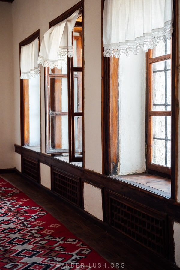 Wooden windows in an old house in Albania.